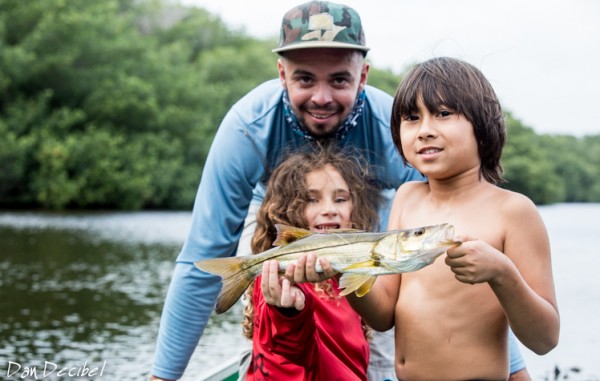 PK and Dan managed to keep their boat dry side up and help the kids catch a fish.